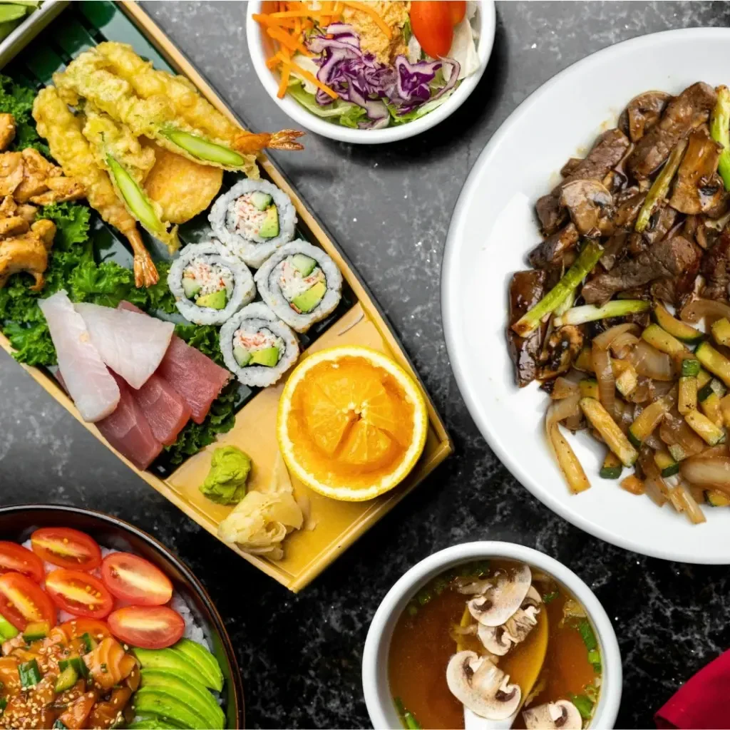 Variety of Japanese and Asian dishes: sushi, tempura, stir-fry.