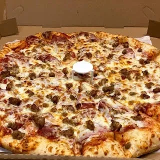 Golden-crusted pepperoni, sausage pizza in open brown box with saver.