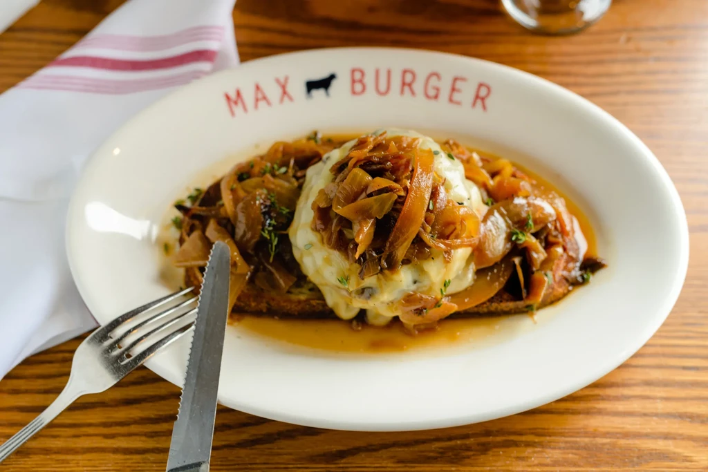 Max Burger patty with melted cheese, caramelized onions, and gravy.