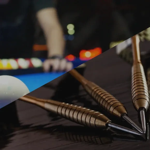 Diagonal split shows a blurry pool game and three textured darts.