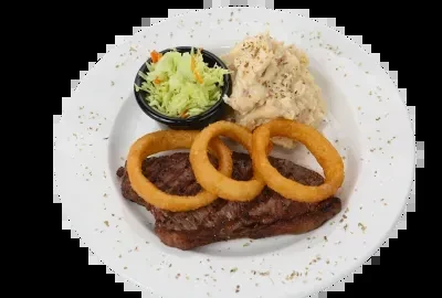 Grilled steak with onion rings, coleslaw, and mashed potatoes on a plate.