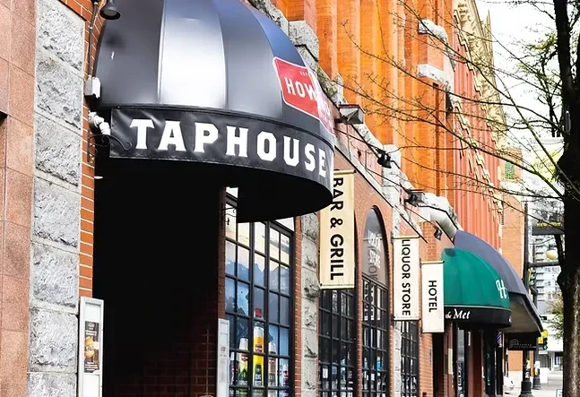 Exterior street view of a Howe Taphouse and Bar & Grill.