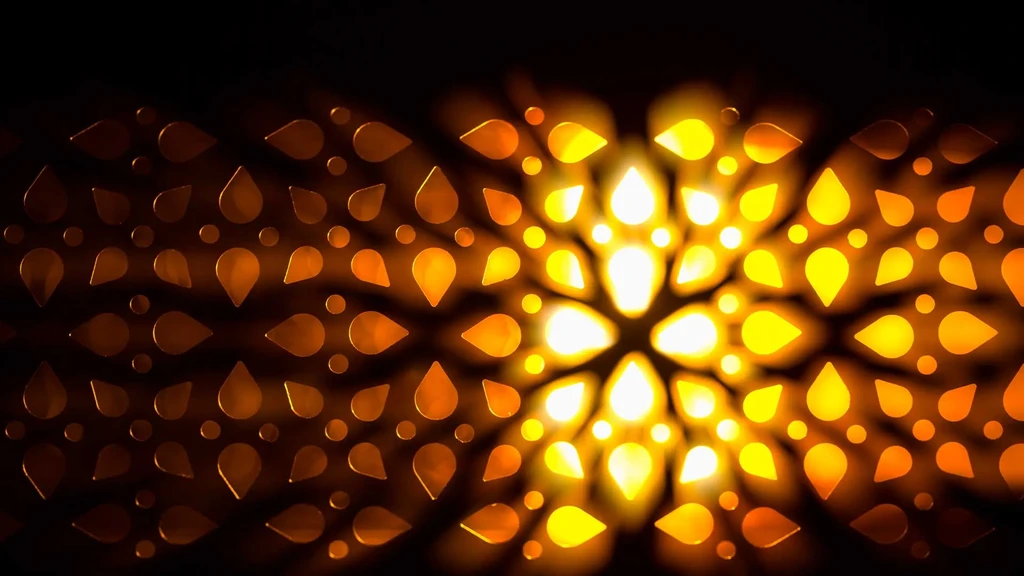 Abstract golden-orange lights form teardrop and floral grid patterns.