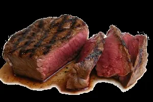 Seared beef steak with grill marks, sliced medium-rare with juices.