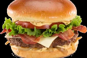 Close-up of a hamburger with brioche bun, beef, bacon, and cheese.