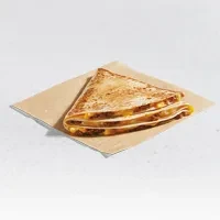 Triangular golden-brown quesadilla filled with melted cheese.