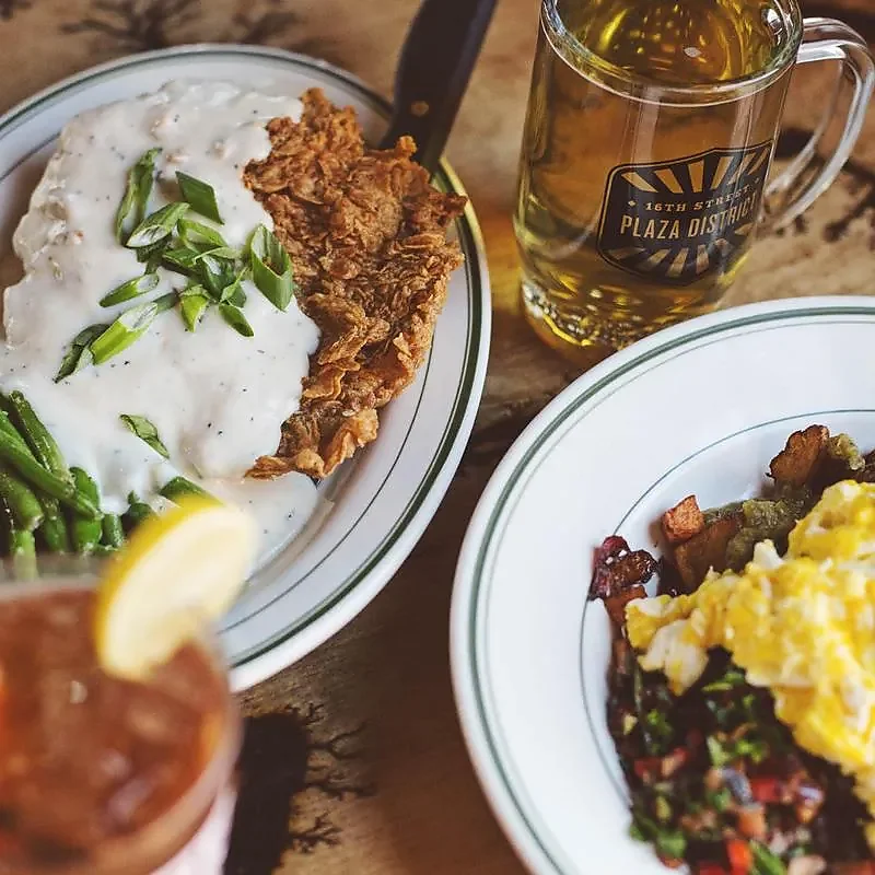 Chicken fried steak with gravy, breakfast hash and draft beer