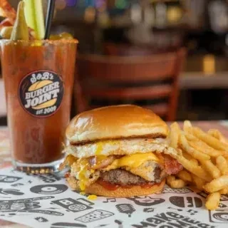 Burger, fries, and Bloody Mary served at JoJo's Burger Joint.