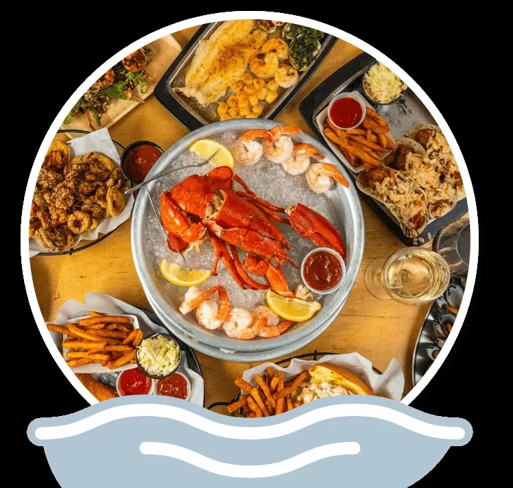 An aerial view of a table filled with various seafood dishes.