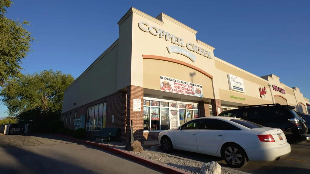 Exterior view of Copper Creek Pub advertising "Home of the Original Chubby Burger."