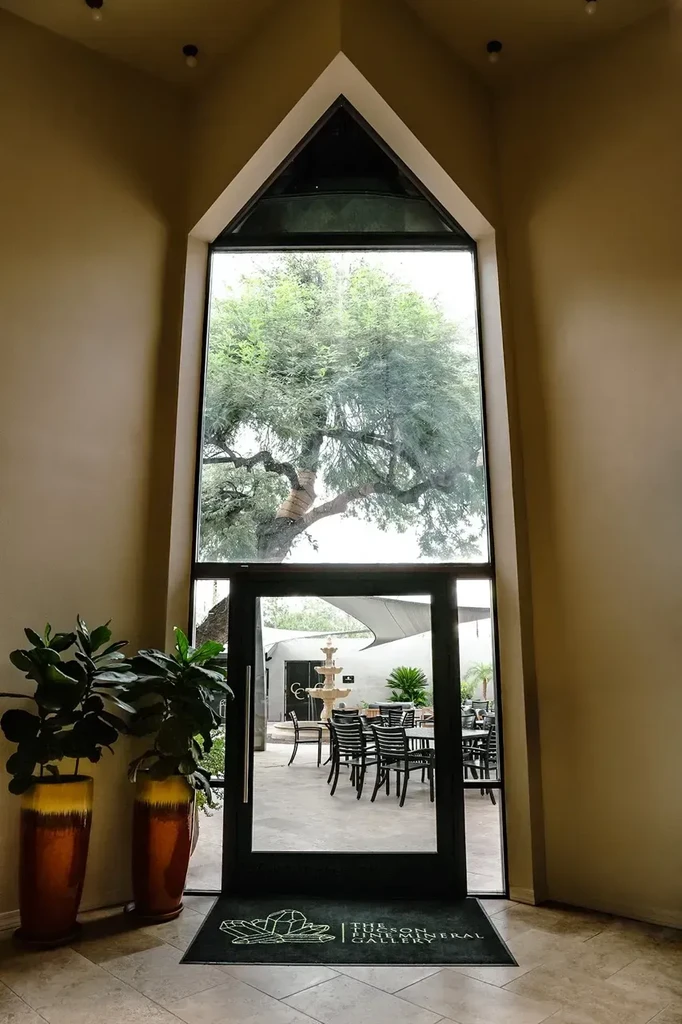 Entryway of Tucson Fine Mineral Gallery overlooking a lively outdoor courtyard.