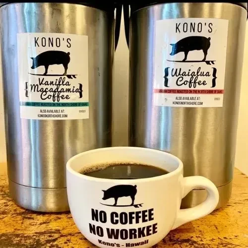 Two Kono's coffee thermoses and a branded mug on wood.