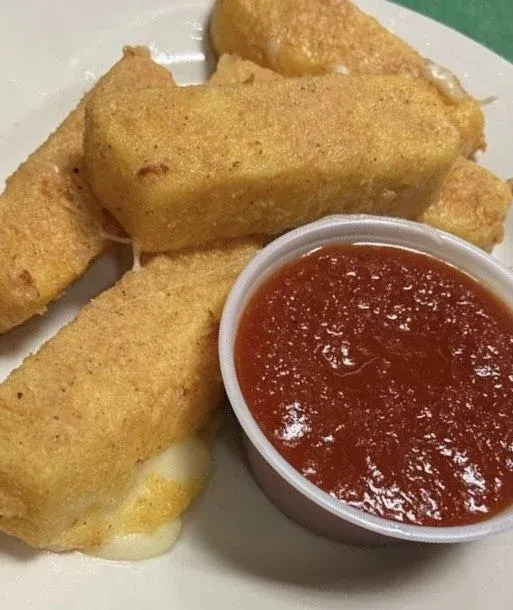 Fried mozzarella sticks with melted cheese and a side of marinara sauce.