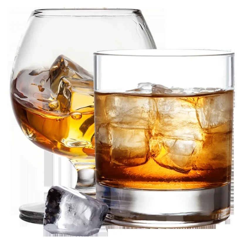 Snifter and rocks glass filled with amber liquid and ice.