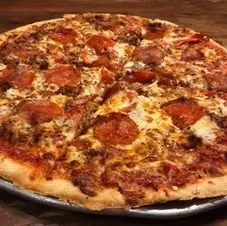 Freshly baked pepperoni and sausage pizza, melted cheese, herbs.