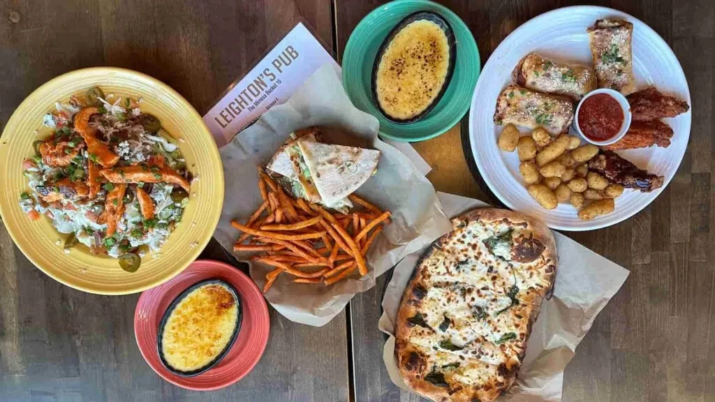Overhead shot of diverse dishes from Leighton's Pub.