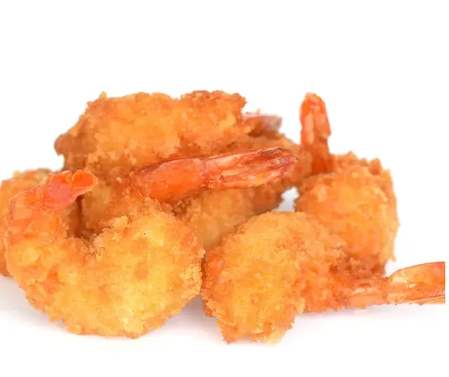 A mound of golden-brown crispy fried shrimp.
