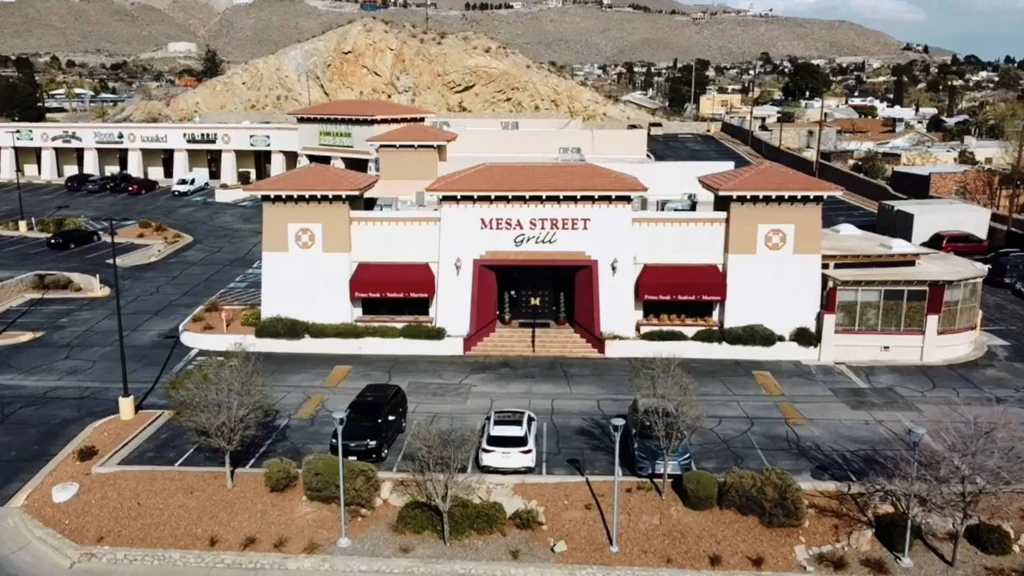 Aerial view of Mesa Street Grill, a Southwestern restaurant with mountains.