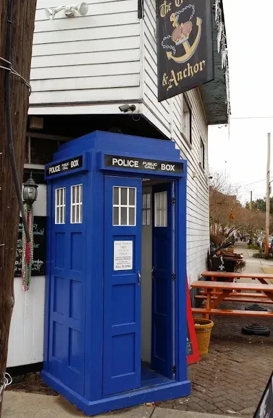 The Crown & Anchor pub with blue TARDIS-like police call box.