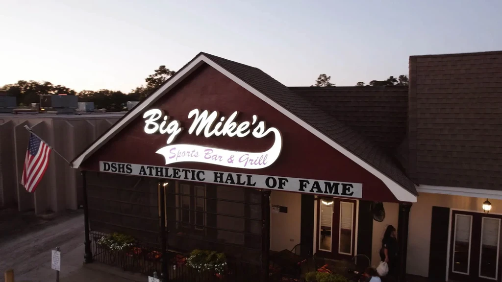 Big Mike's Sports Bar & Grill and Athletic Hall of Fame at dusk.