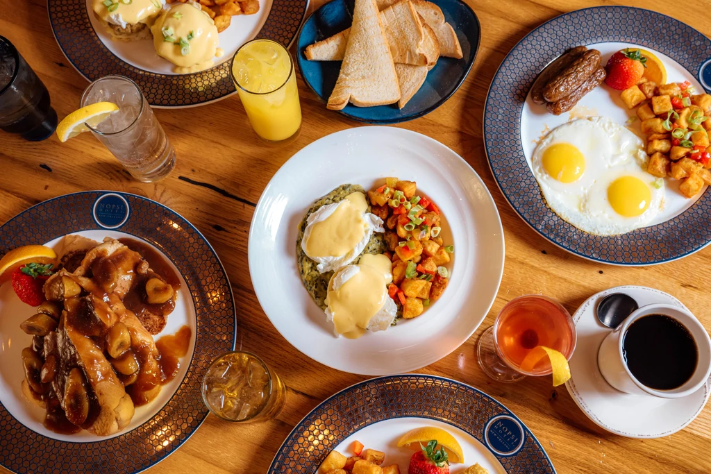 Overhead shot of breakfast and brunch at NOPSI Hotel New Orleans.