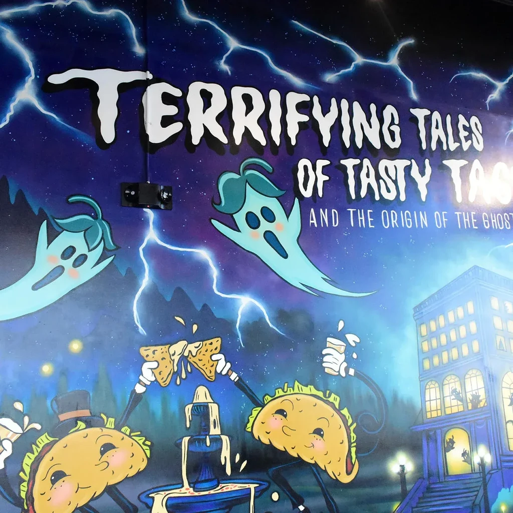 Colorful mural: "Terrifying Tales of Tasty Tacos and the Ghost Pepper."