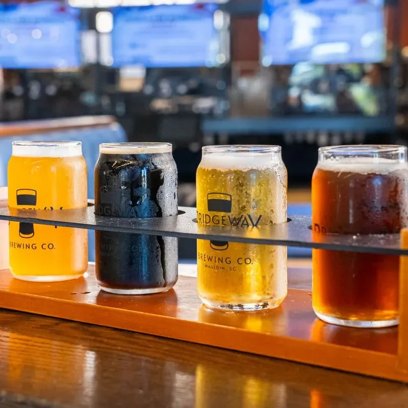 A Ridgeway Brewing Co. beer flight with four cold beers.