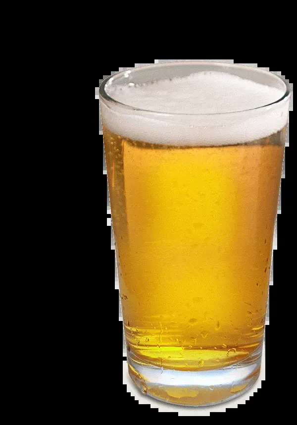 Cold glass of golden beer with thick foam on black background.