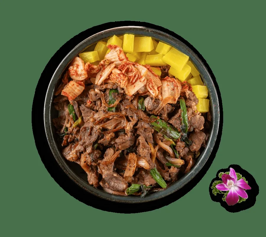 Korean meat and vegetable dish with kimchi, pickled daikon, and orchid.