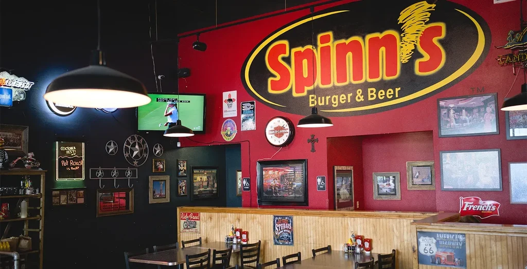 Wide shot of Spinn's Burger & Beer's casual, themed restaurant interior.