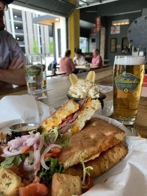 Sandwich, salad, and beer at Mallack's Public House restaurant.