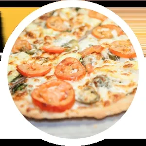 Sliced pizza with melted cheese, red tomatoes, and green peppers.