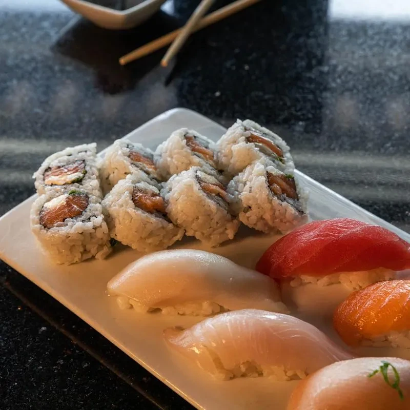 Assorted fresh sushi platter with maki and nigiri.