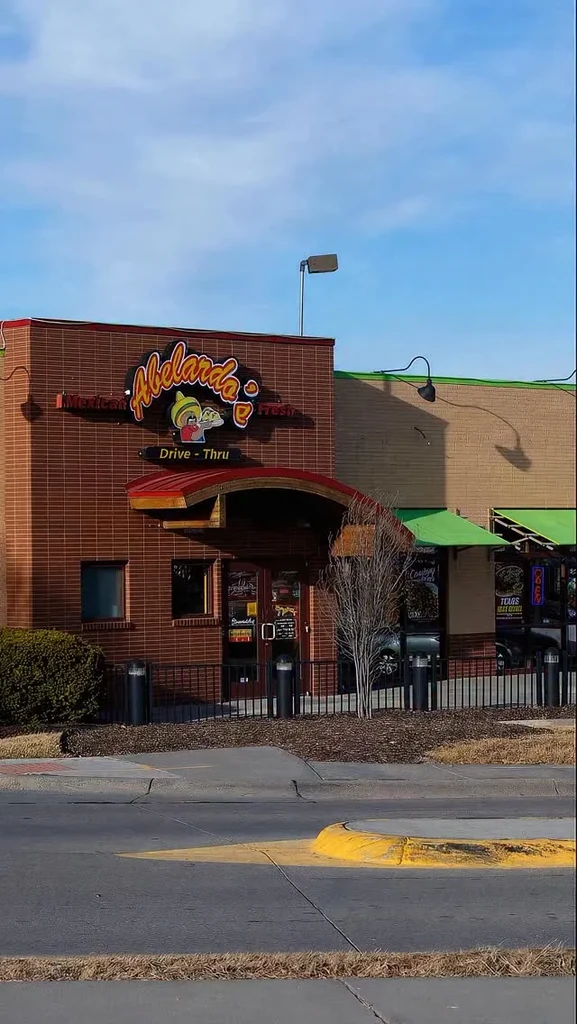 Abelarda's Mexican Fresh restaurant exterior, brick building with drive-thru sign.
