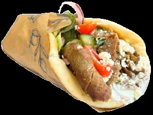 Greek gyros wrap with meat, vegetables, creamy sauce, and feta cheese.