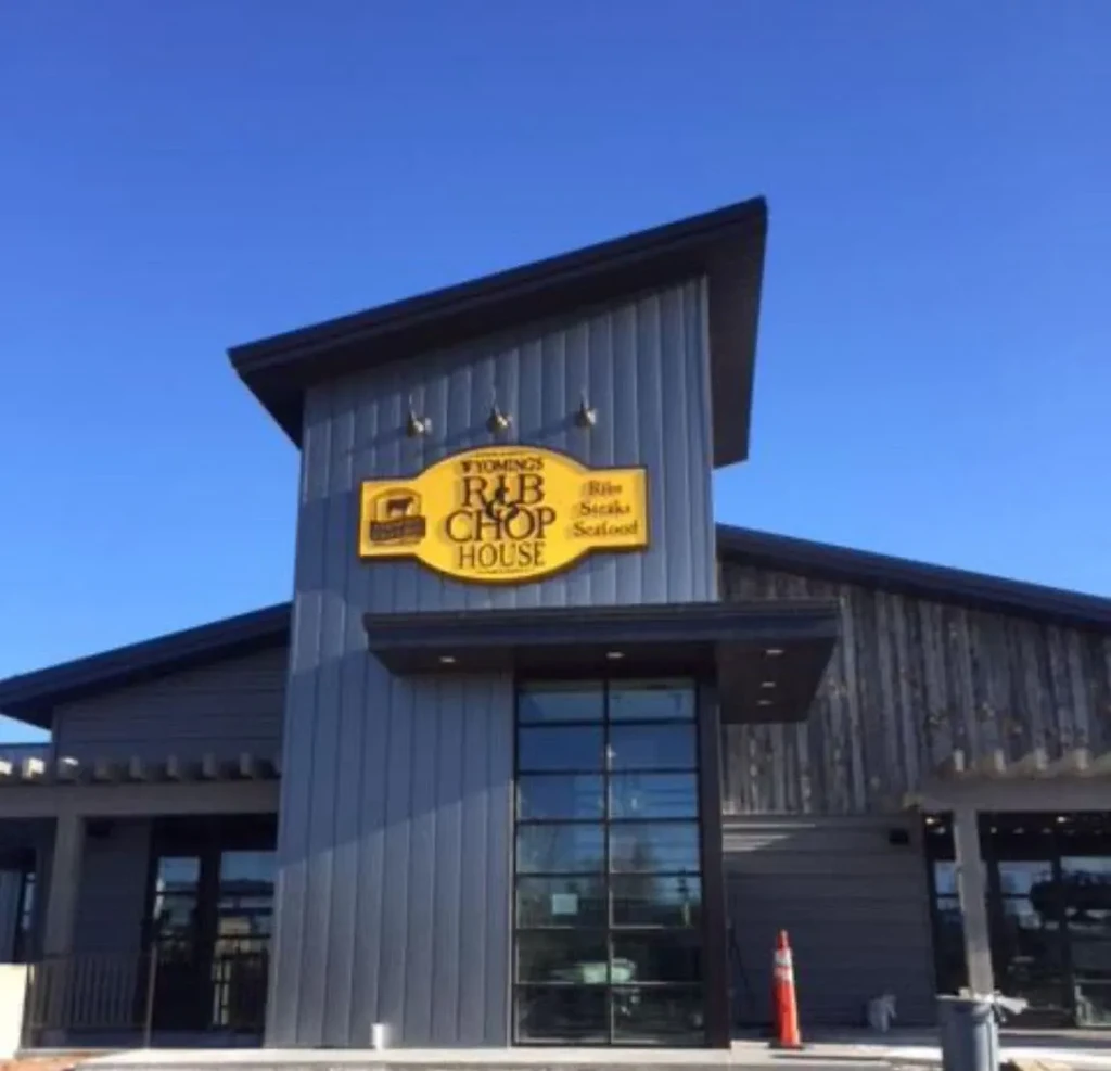 WYOMING'S RIB CHOP HOUSE: Modern dark grey and wood restaurant exterior.