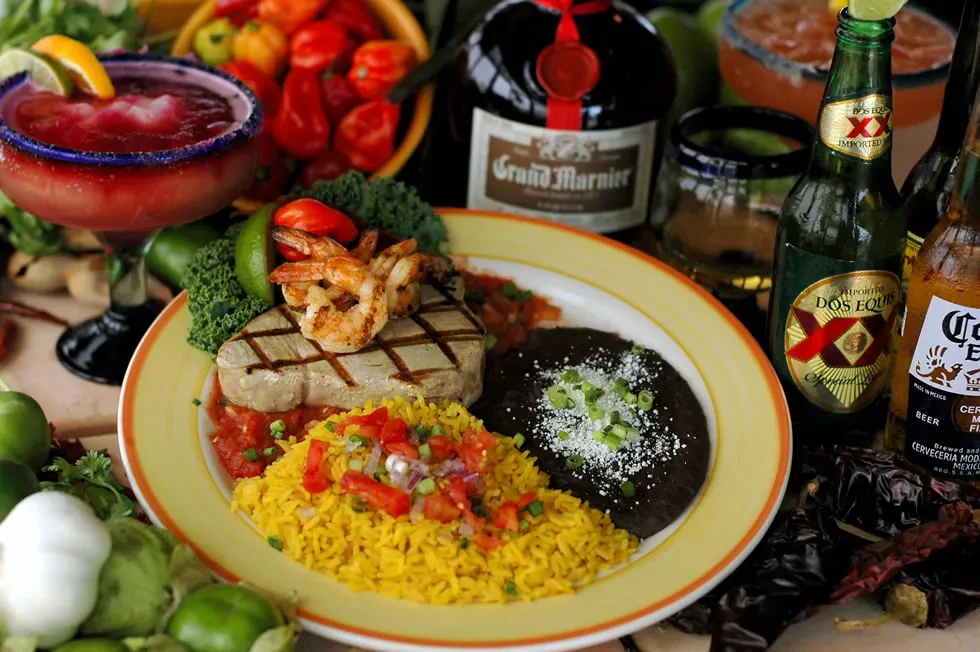 Mexican grilled tuna and shrimp meal, rice, beans, margarita, beers, Grand Marnier.