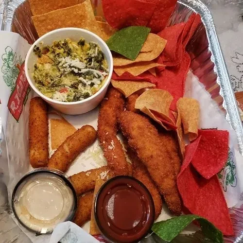 Overhead platter of R.J.'s spinach dip, mozzarella sticks, chicken, and chips.