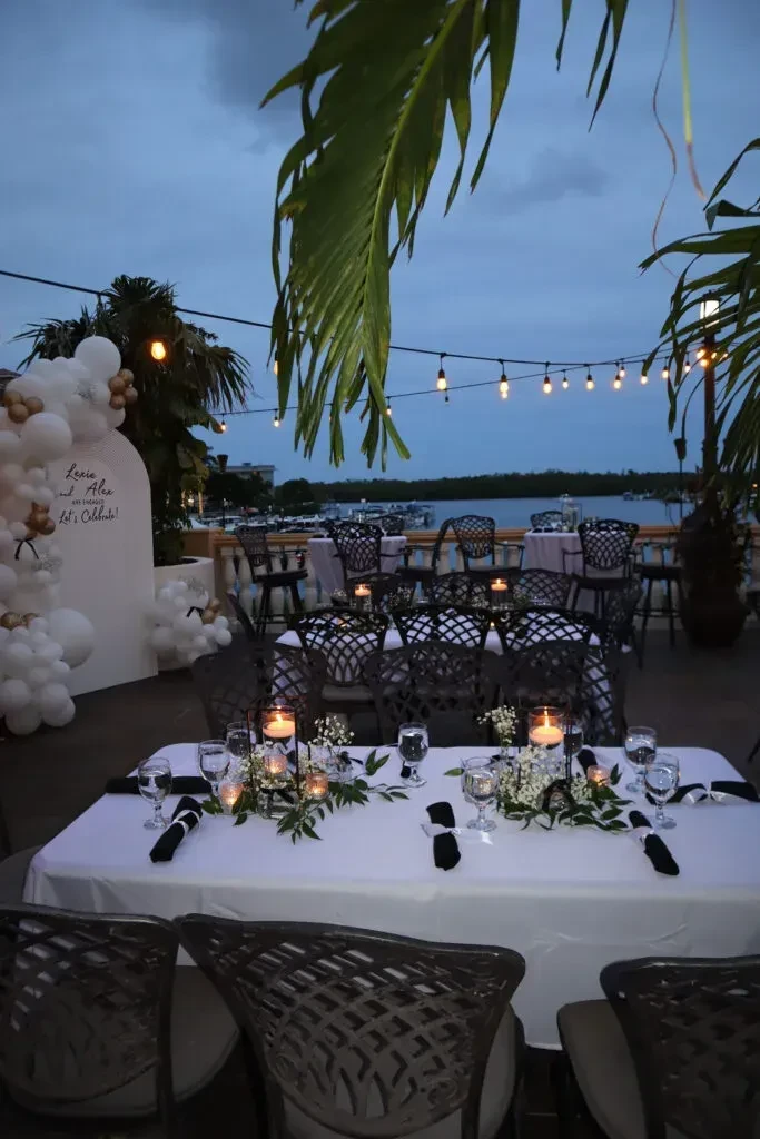 Outdoor terrace dining setup for Lexie and Alex's engagement party.