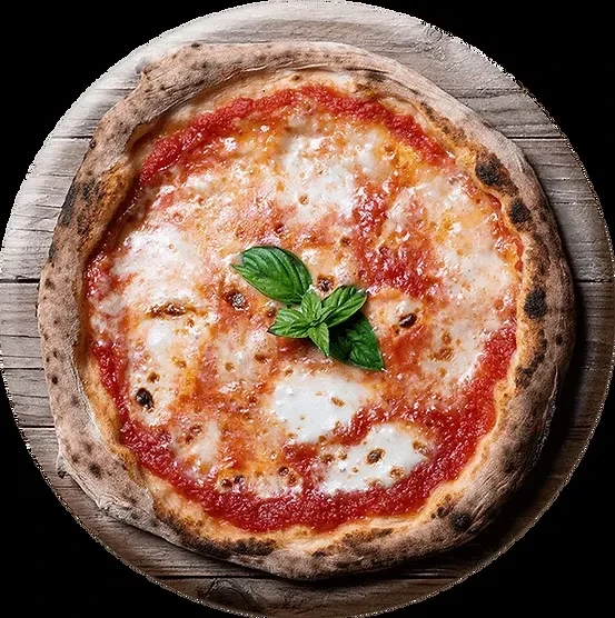 Overhead Margherita pizza with charred crust and basil on wood.