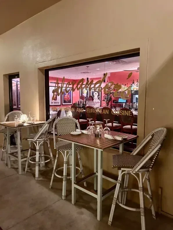 Alexander's Italian and European restaurant with patio and bar interior.