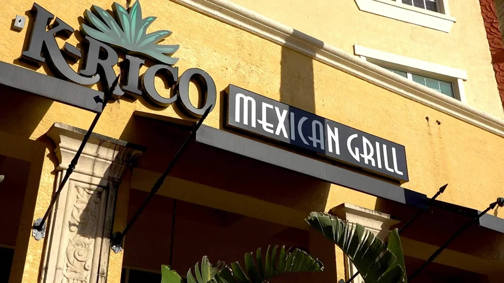 K-RICO MEXICAN GRILL sign with agave logo on yellow building.