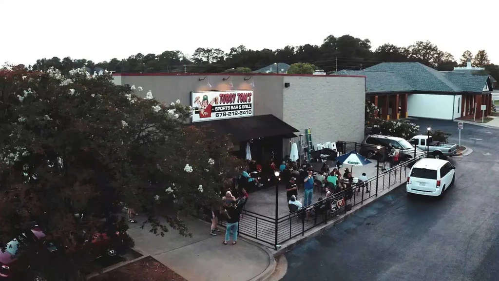Aerial view of Tubby Tom's Sports Bar and its lively patio.