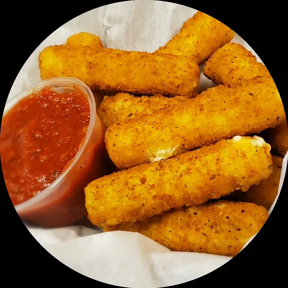 Crispy golden mozzarella sticks in a basket with chunky marinara sauce.
