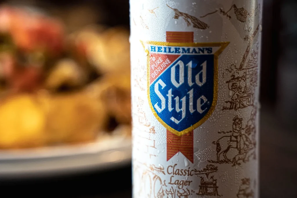 Close-up of a cold, condensation-covered Old Style beer can.