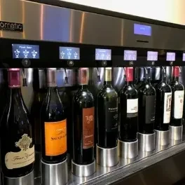 Modern Omatic wine dispenser with ten bottles in stainless steel.