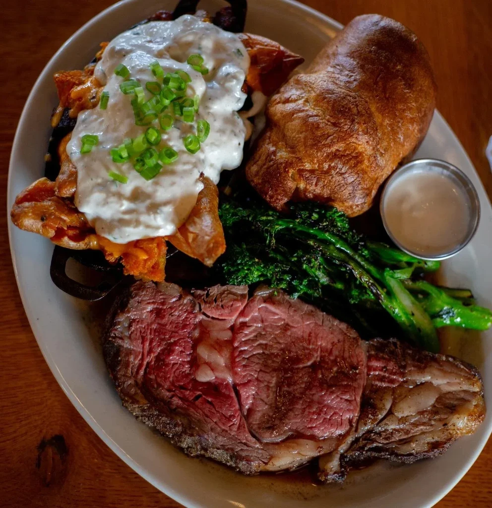 Generously portioned roast beef, asparagus, Yorkshire pudding, and creamy sweet potatoes.
