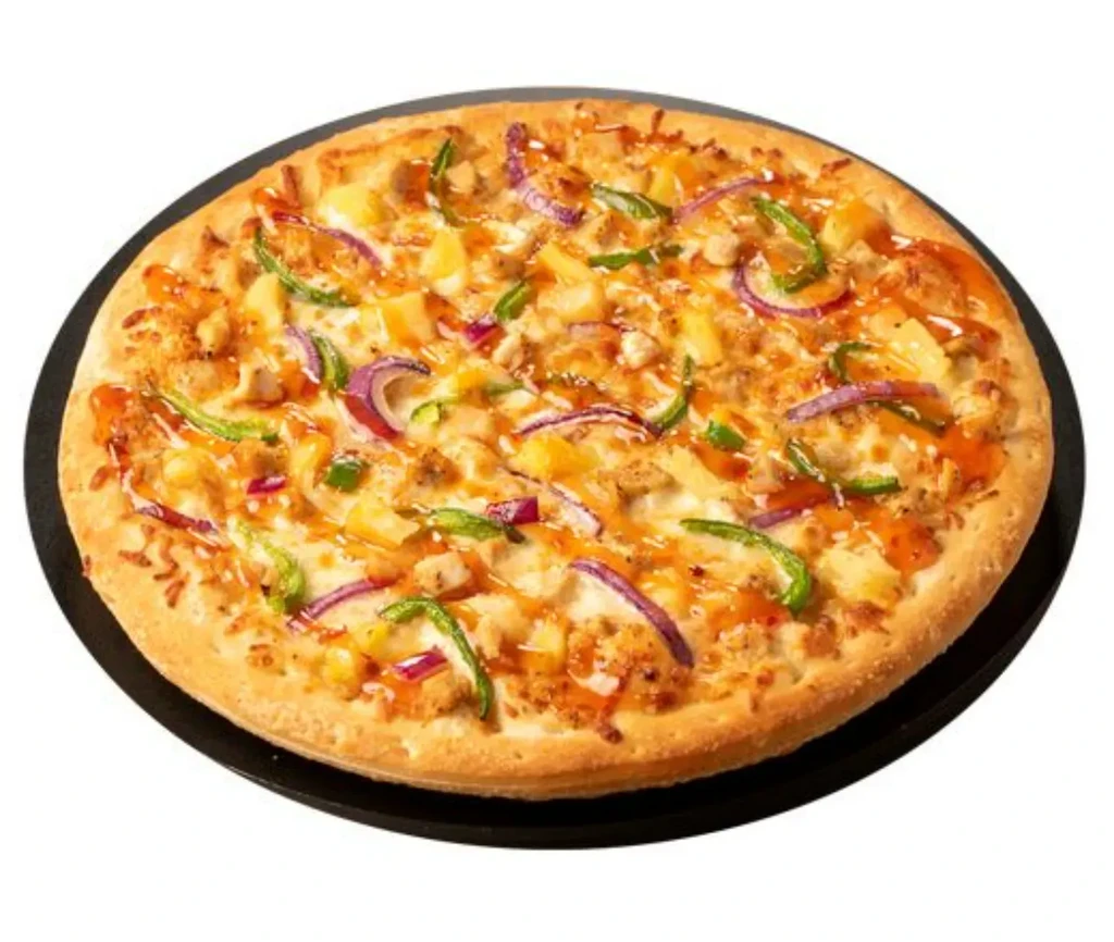 Cooked pizza, chicken, pineapple, red onion, bell pepper, sauce, sesame seeds.