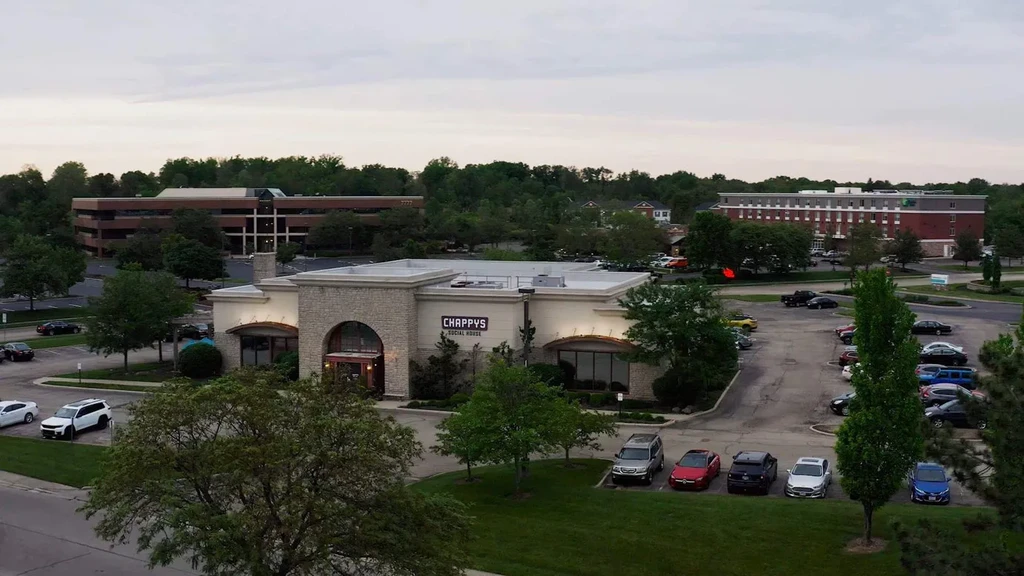 Chappy's Social House in a suburban commercial complex under an overcast sky.