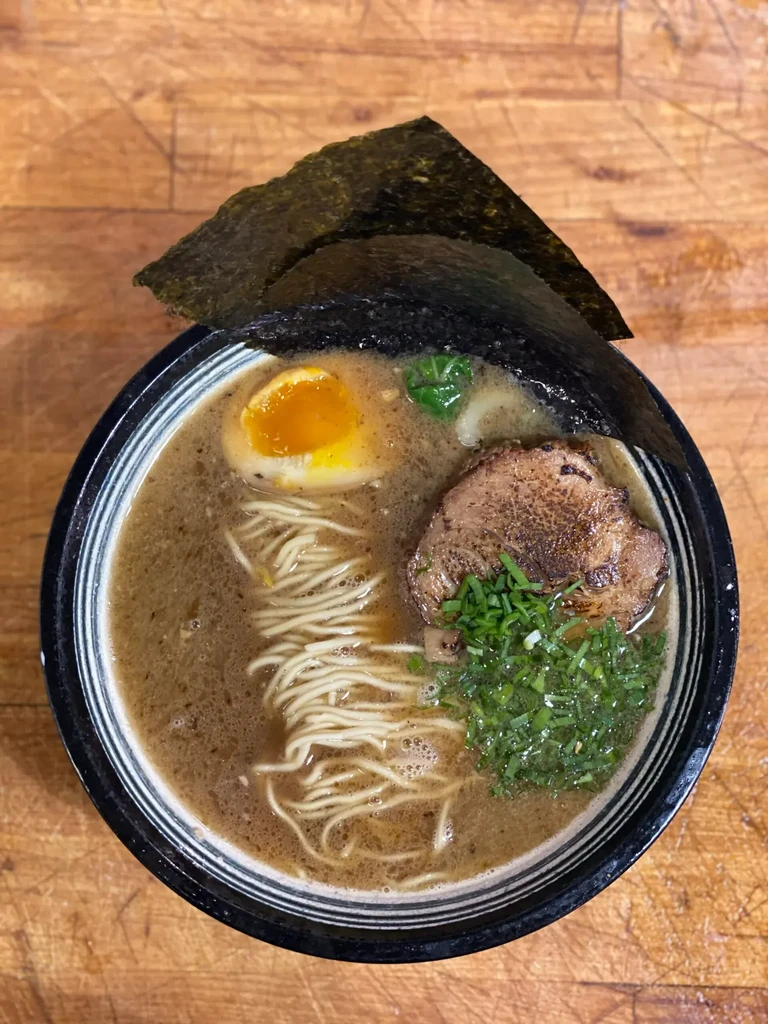 Overhead shot of ramen with Ajitama egg, Chashu pork, and nori.